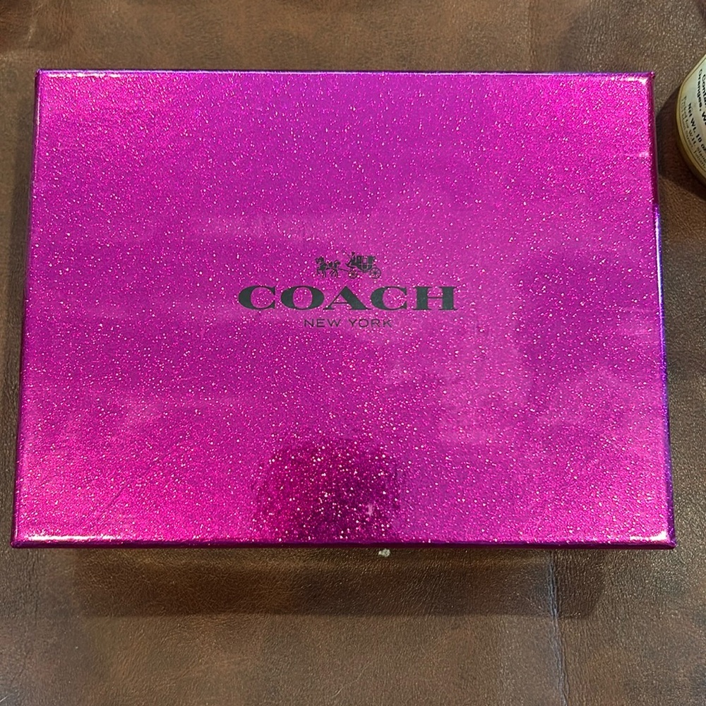 Pink coach wristlet